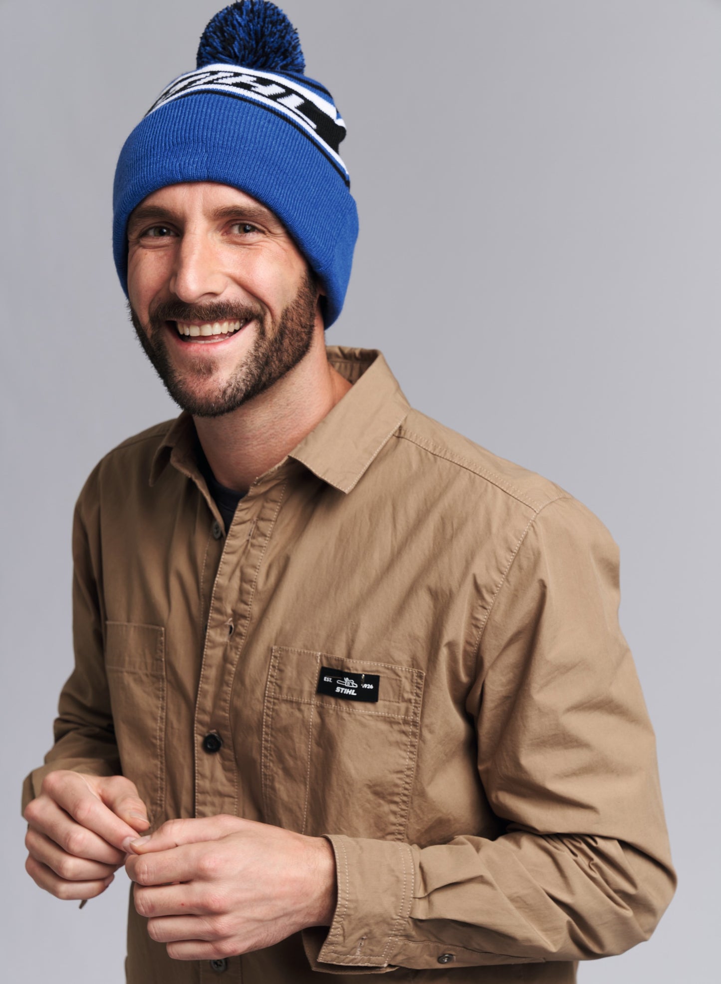 IDEA REGALO - CAPPELLINO IN LANA BLU CON POMPON ORIGINALE STIHL