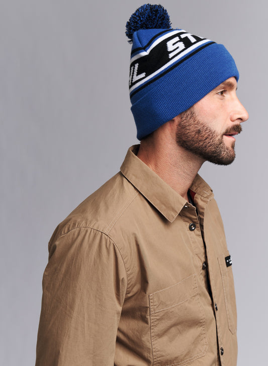 IDEA REGALO - CAPPELLINO IN LANA BLU CON POMPON ORIGINALE STIHL